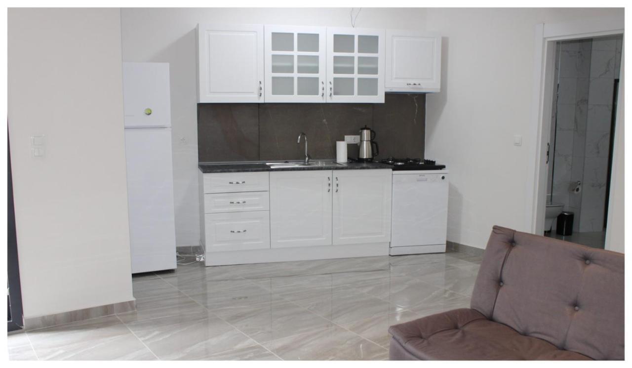 Capo Calaberno Aparts Aparthotel Karaburun  Bagian luar foto